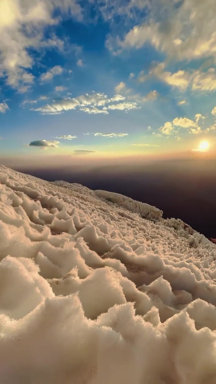 Aerial View of Snow-Covered Mountain Peak