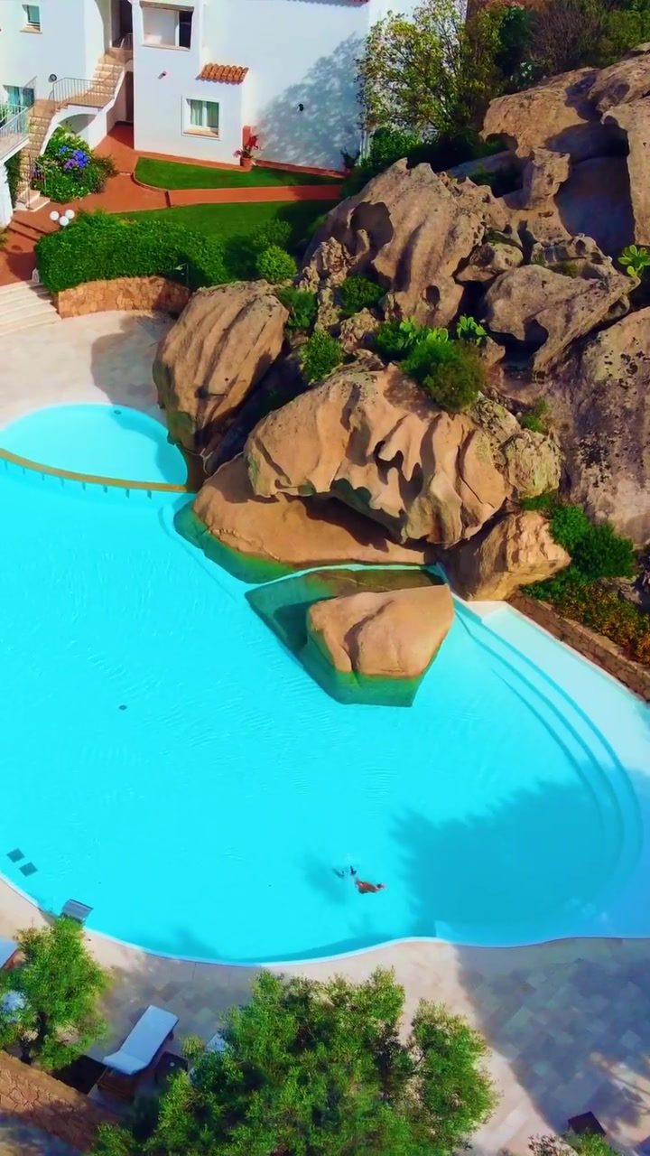 Aerial Tour: Luxury Pool Design with Rock Formations