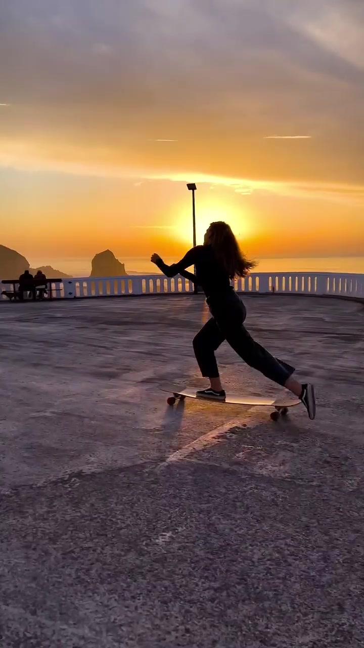 Longboarding Sunset at Praia de Santa Cruz