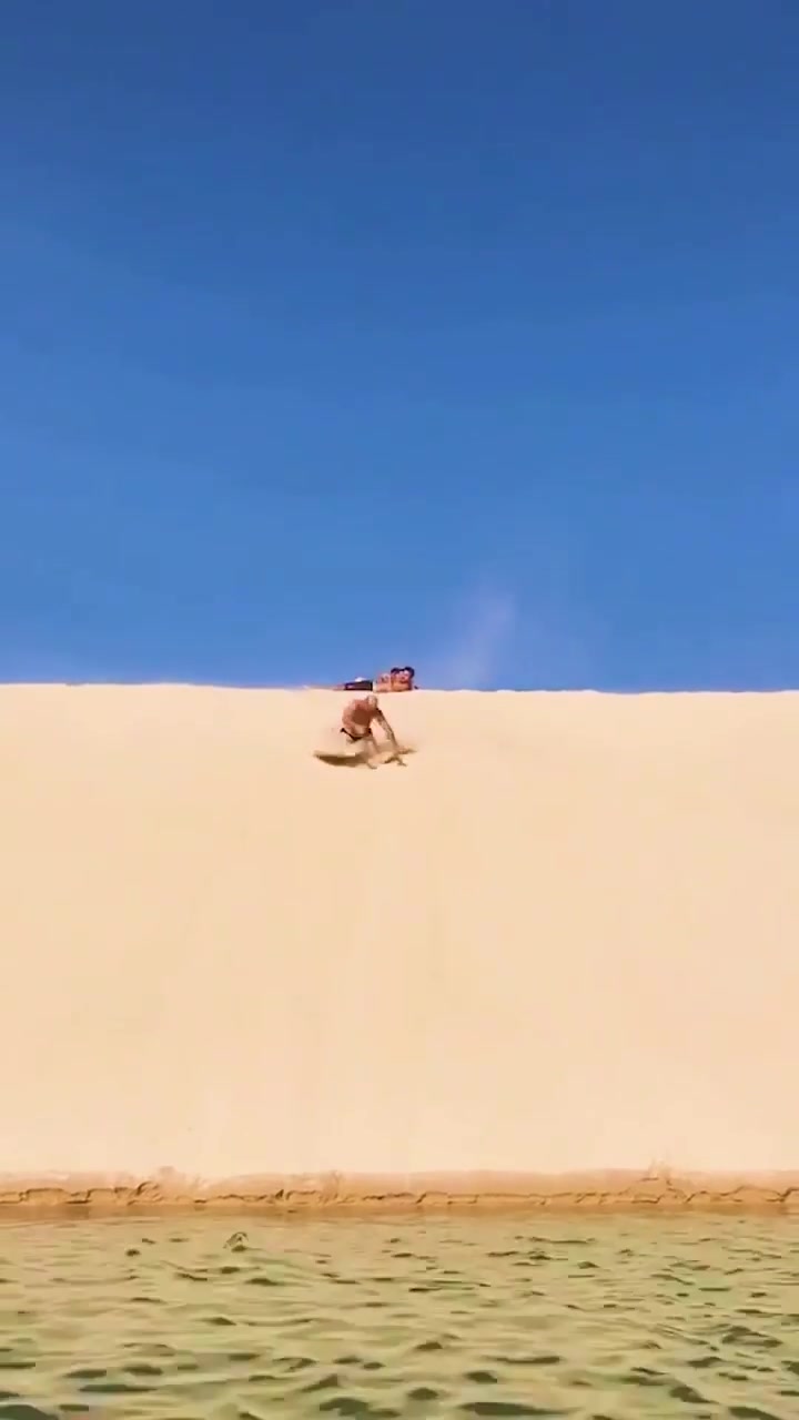 Cliff Jumping Off Sand Dunes: Beach Thrills