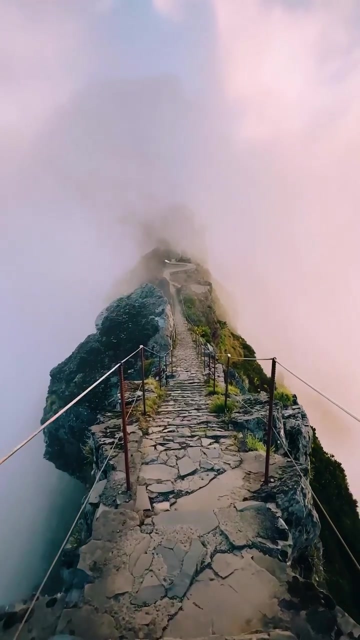 Mountain Path in Fog: Dramatic Climb