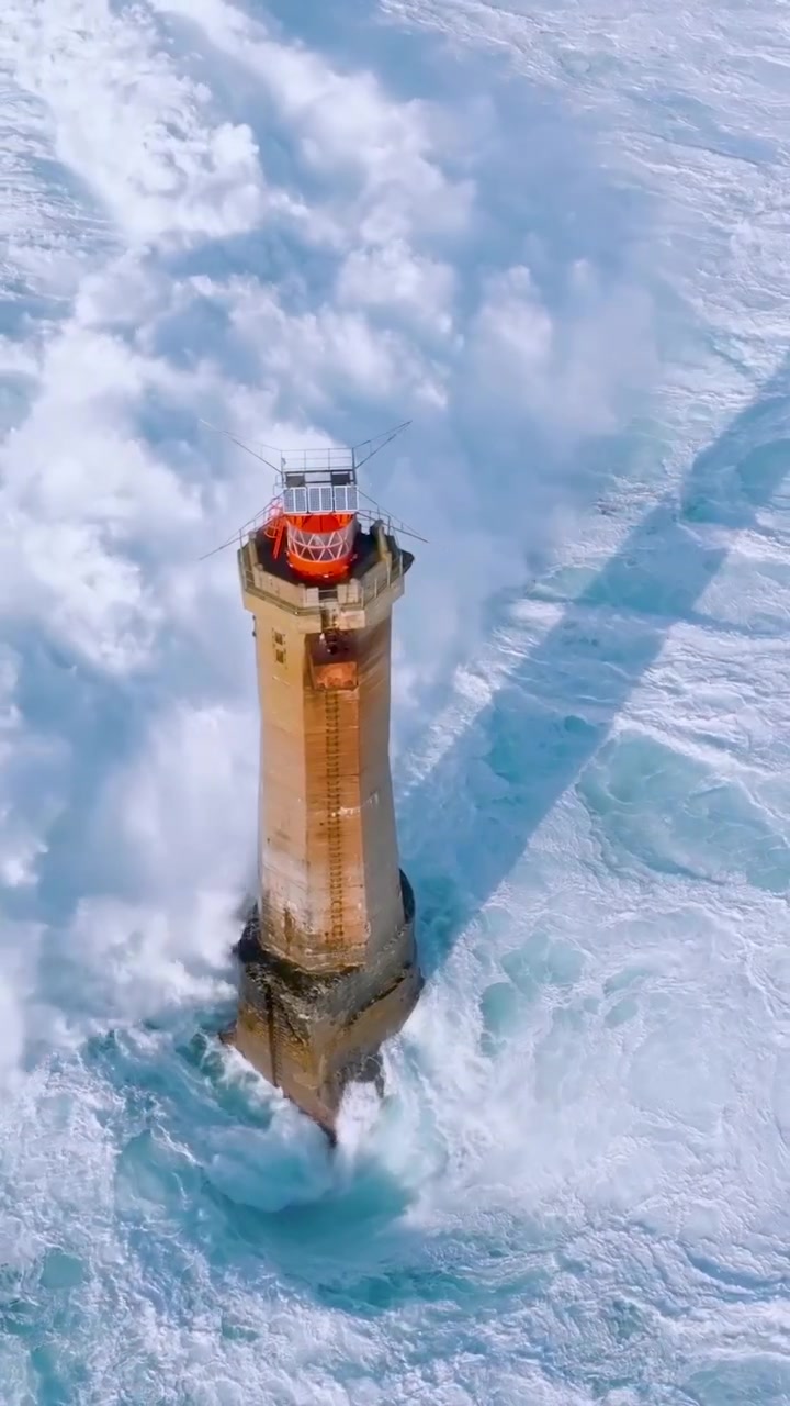 Lighthouse Endures Stormy Waves