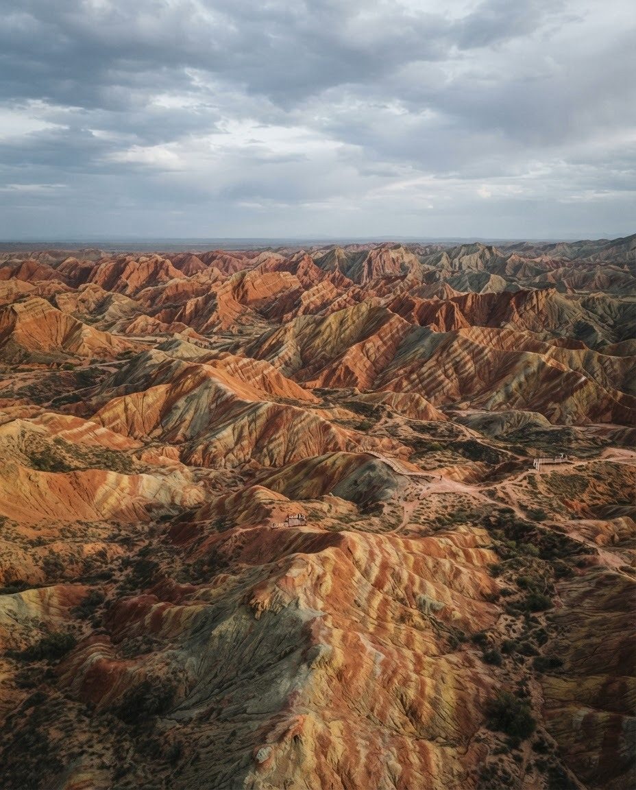 Aerial View of Colorful Layered Canyon Landscape