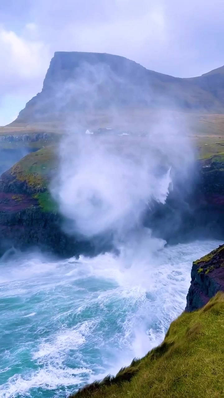 Coastal Waterfall: Dramatic Wave Action Video
