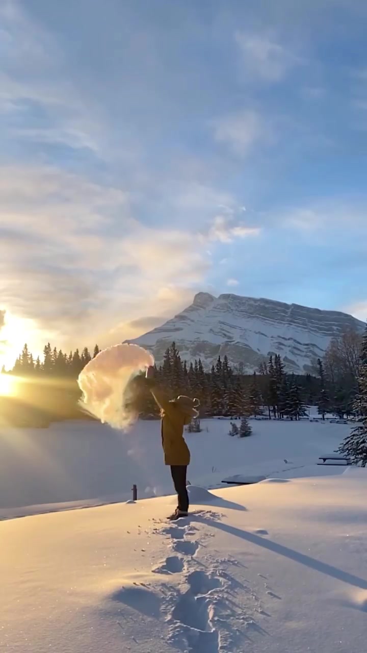 Snow Throwing Fun at Cascade Ponds, Canada
