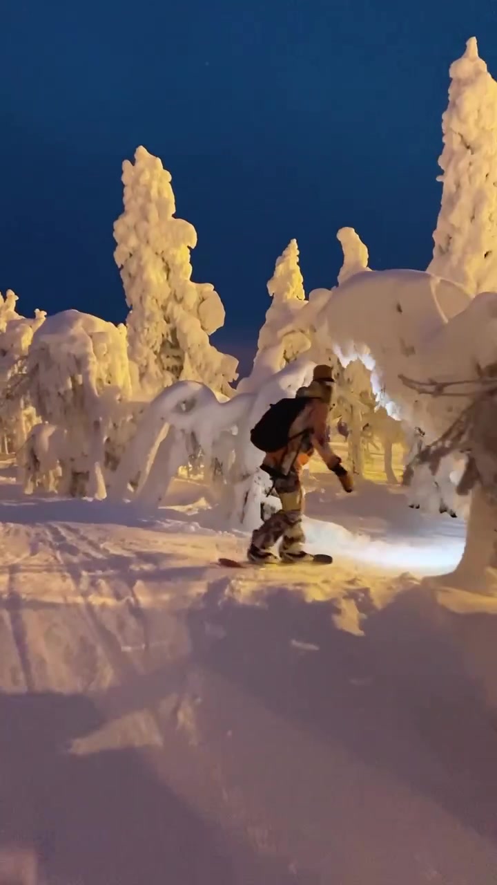 Snowboarding Through a Snowy Forest
