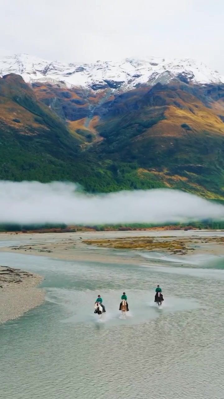 Horseback Riding in Snowy Mountain River Scenery