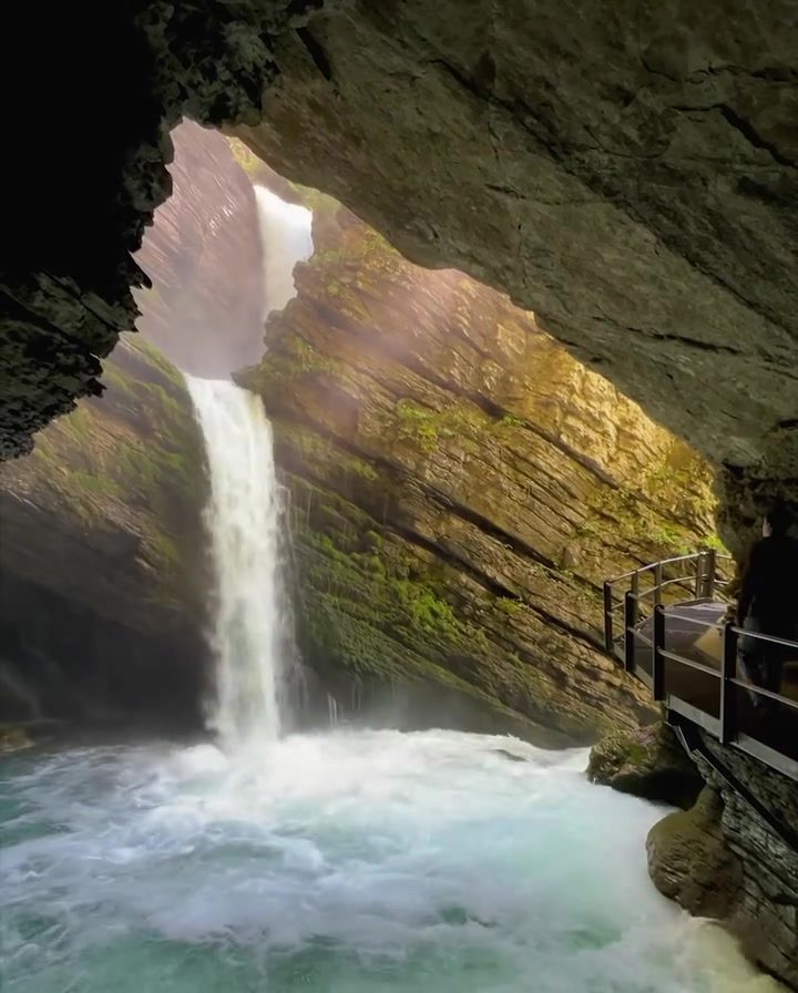 Discovering the Beauty: Cave-Framed Waterfall in All Its Glory