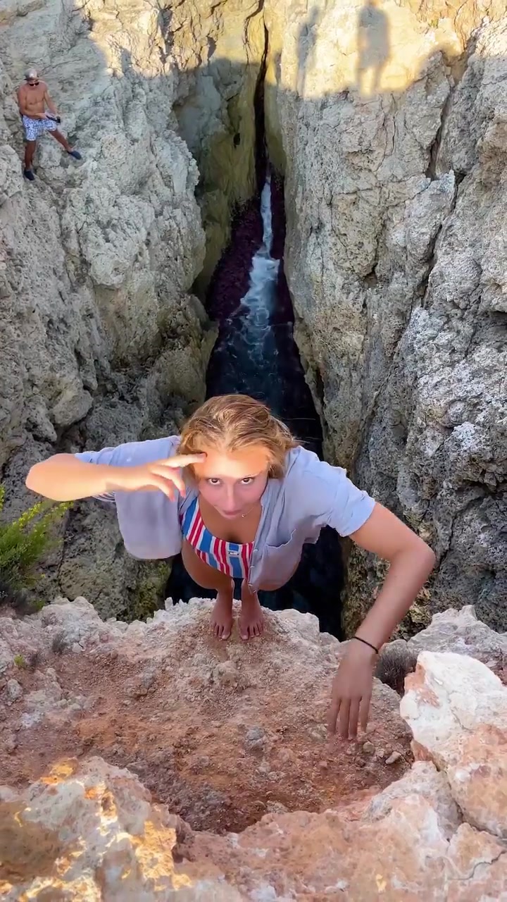 Malta Cliff Jumping: Athlete Dives into Waterfall