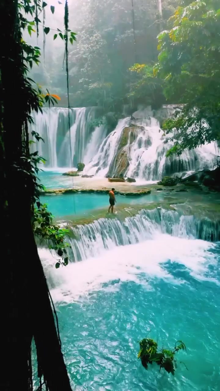 Multi-Tiered Waterfall with Turquoise Pool
