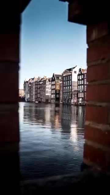Explore Amsterdam's Historic Charm: Architecture & Cycling