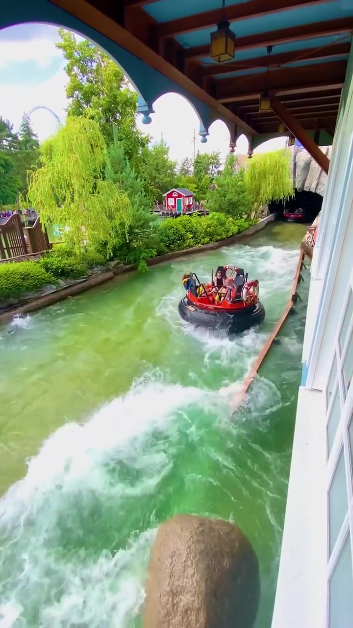 Amusement Park Log Flume Ride in Action