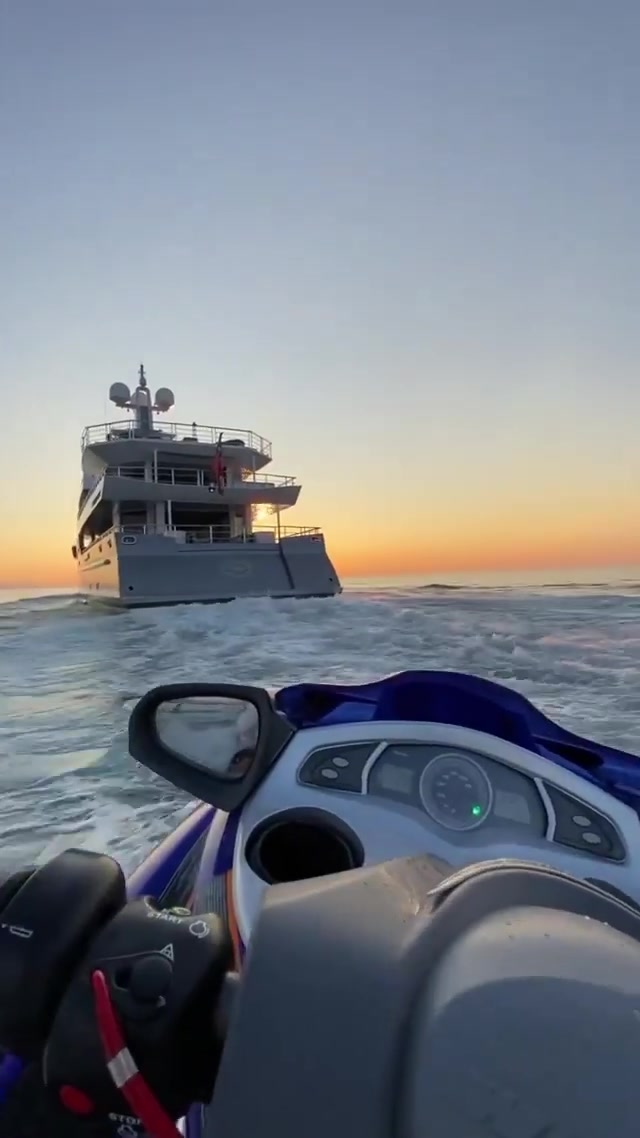 Jet Skiing to Yacht: Sunset Water Adventure