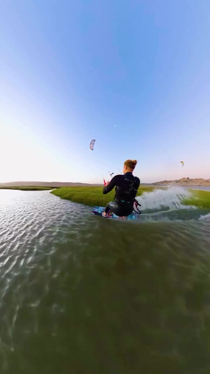 Kiteboarding Jump: Aerial Maneuver Over Water