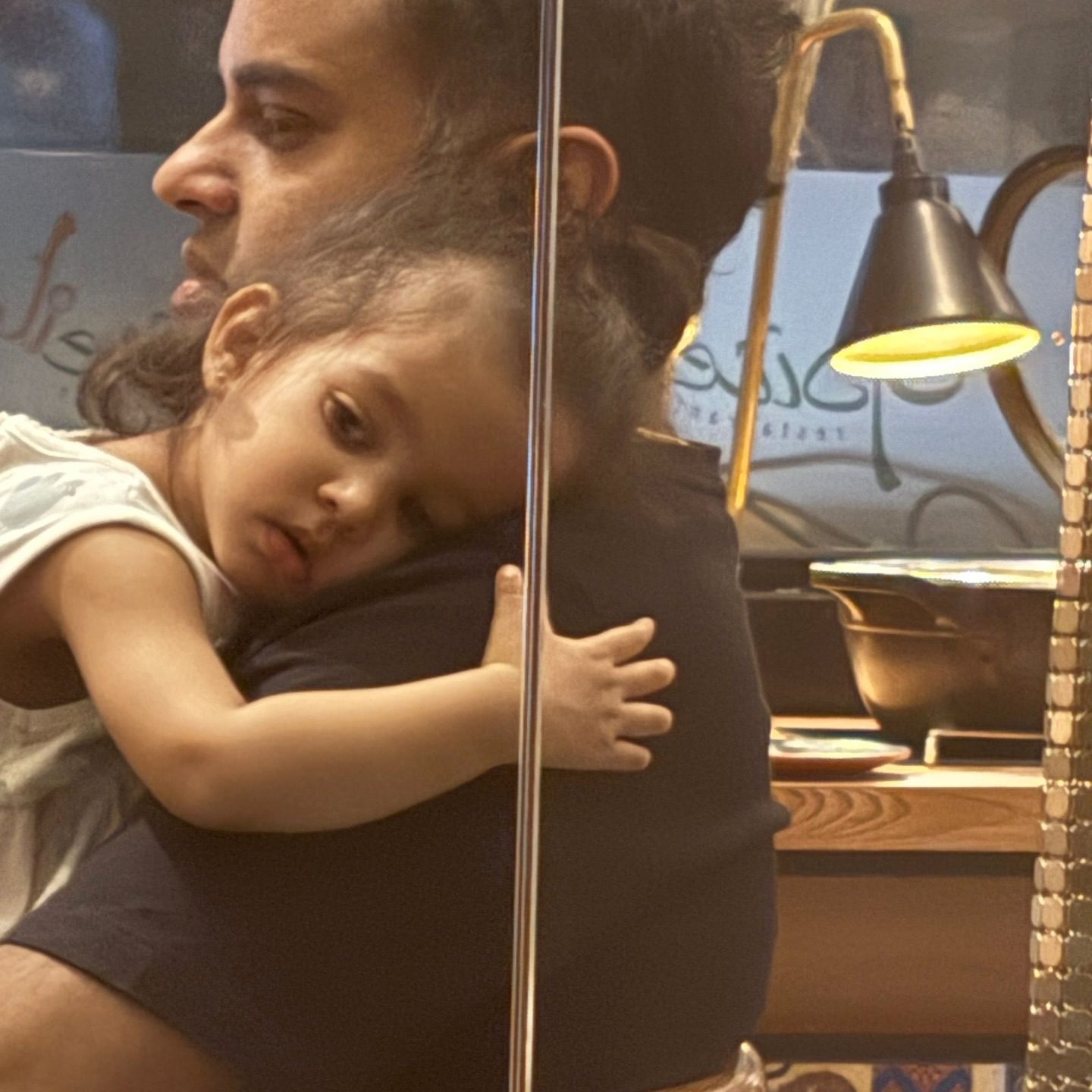 Finding Comfort in Chaos: A Father's Bond with His Daughter