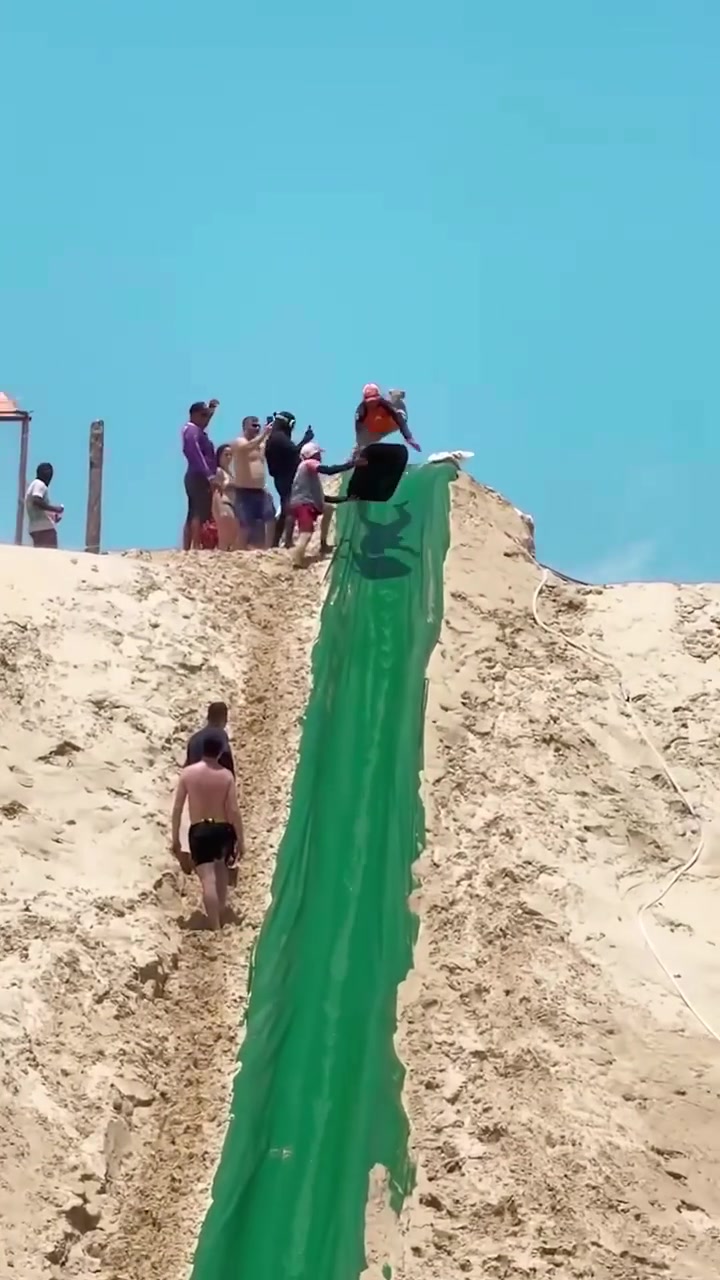 Beach Slide Fun: Ocean Ending Slide