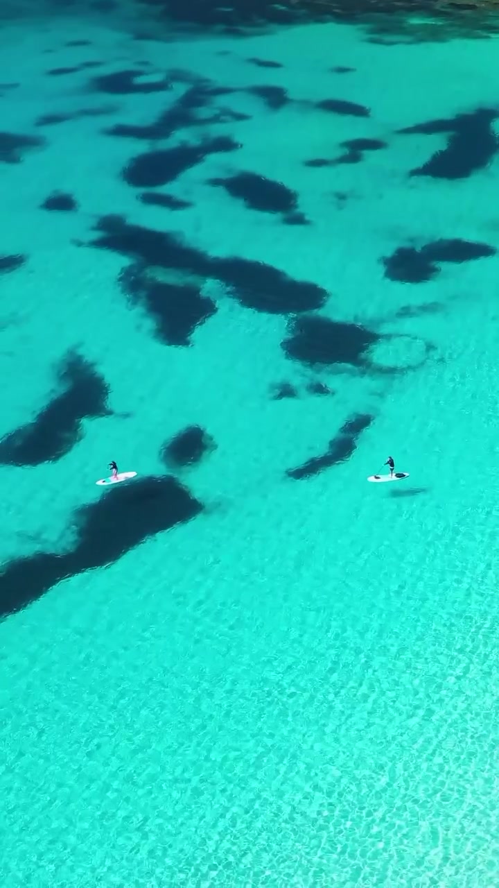 Paddleboarding in Sardinia's Turquoise Waters