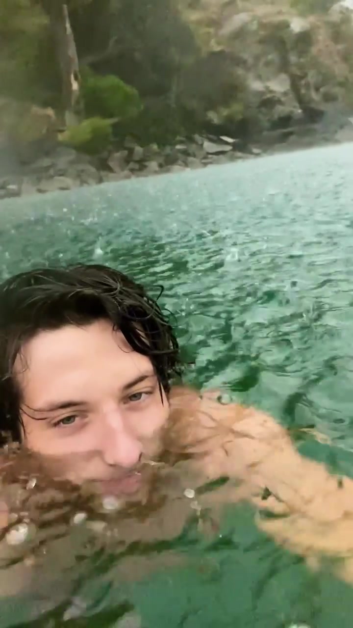 Swimming in a Lake During Rainy Weather