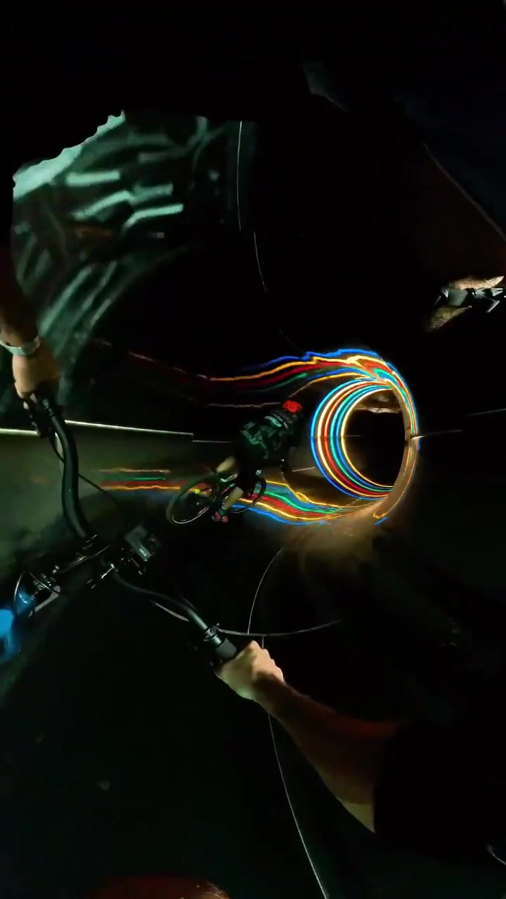 Bike Riding Through Water Slide: First-Person View