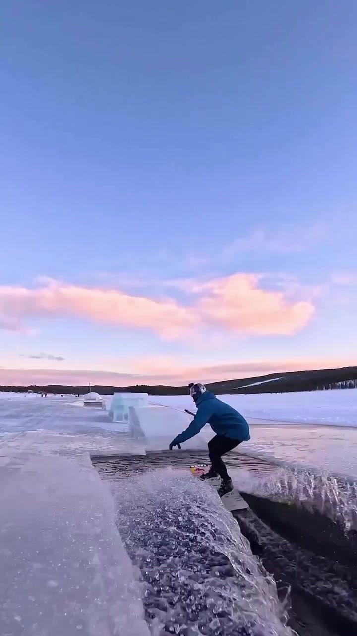 Snowboarding on a Frozen Lake in Jokkmokk