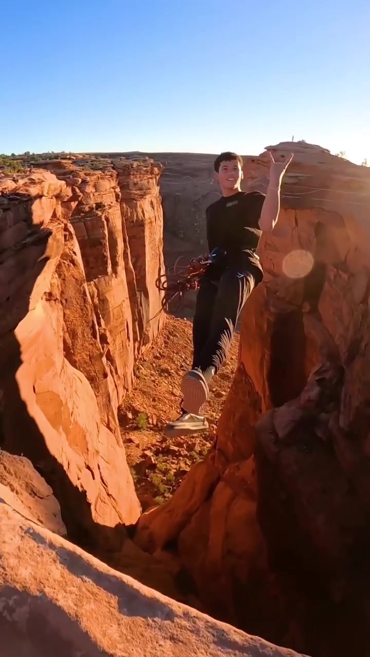 Canyon Adventure: Standing on a Narrow Ledge