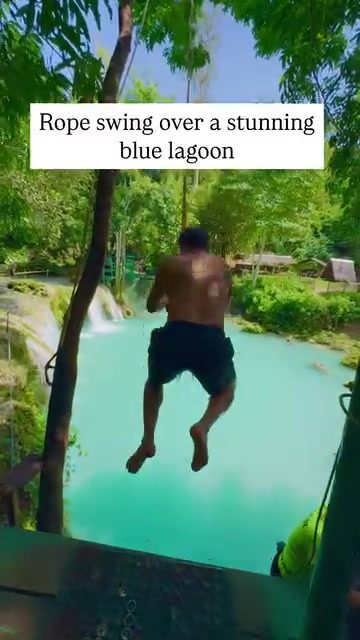 Experience the Thrill: Rope Swinging Over a Blue Lagoon