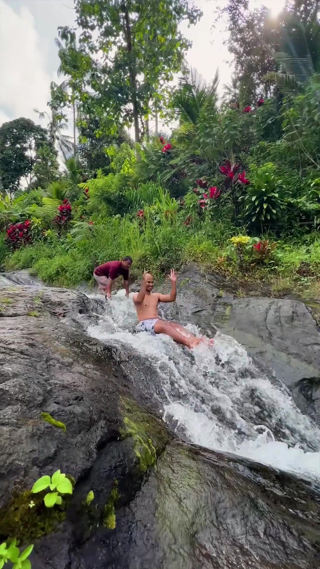 Natural Water Slide Adventure in Tropical Paradise