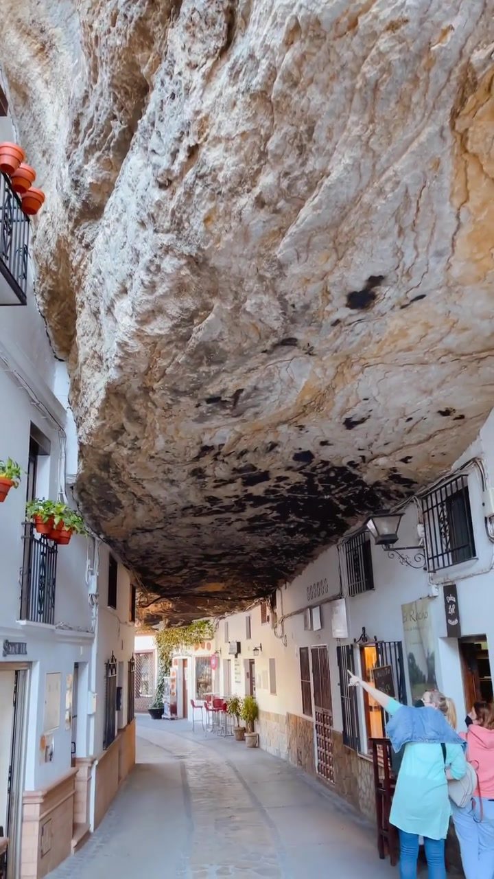 Explore the Enchanting Street with a Natural Rock Ceiling