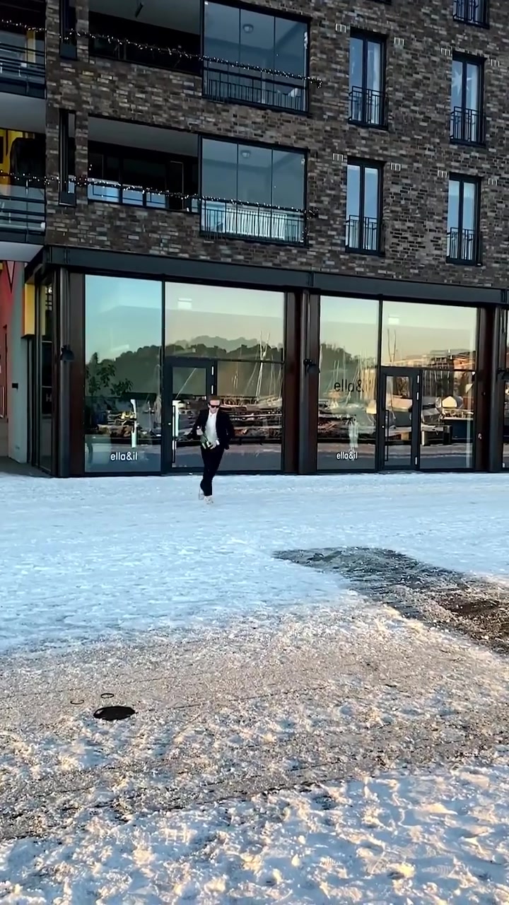 Celebratory Jump in Oslo Snow