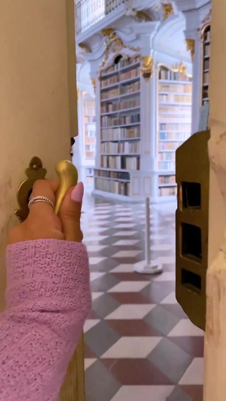 Historic Library Reveal: Ornate Architecture and Books