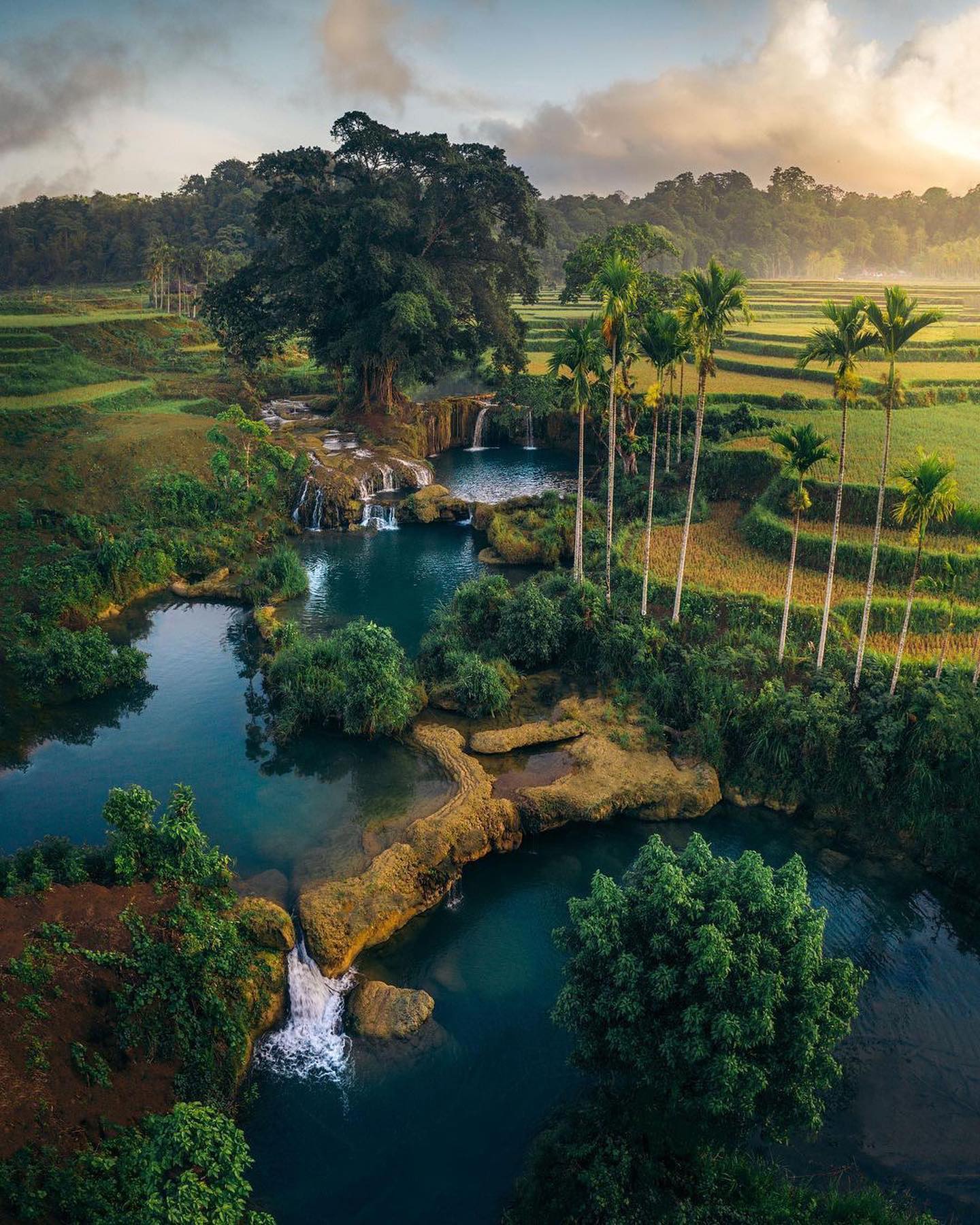 Indonesia's Magical Landscapes: Waterfalls and Rice Fields