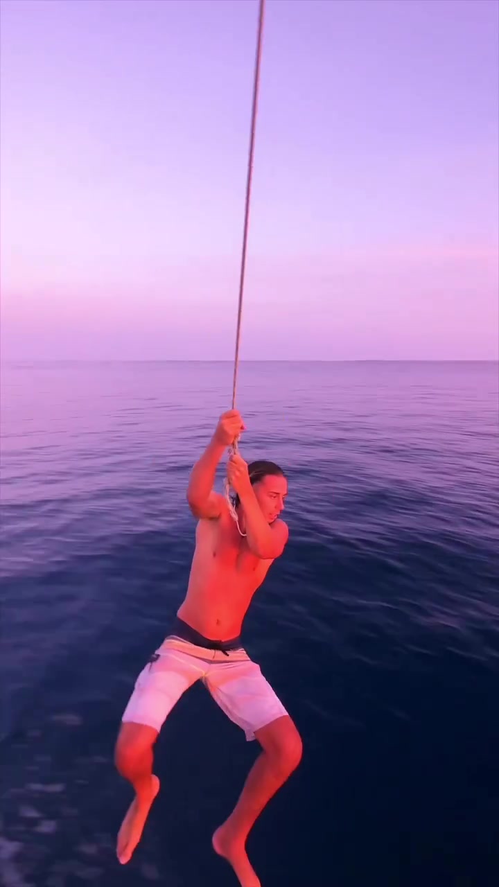 Rope Swing Ocean Fun: Watersports Adventure