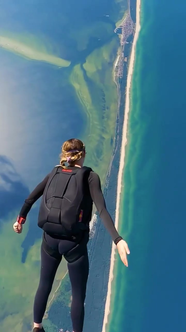 Red Bull Skydiving Stunts Over Ocean