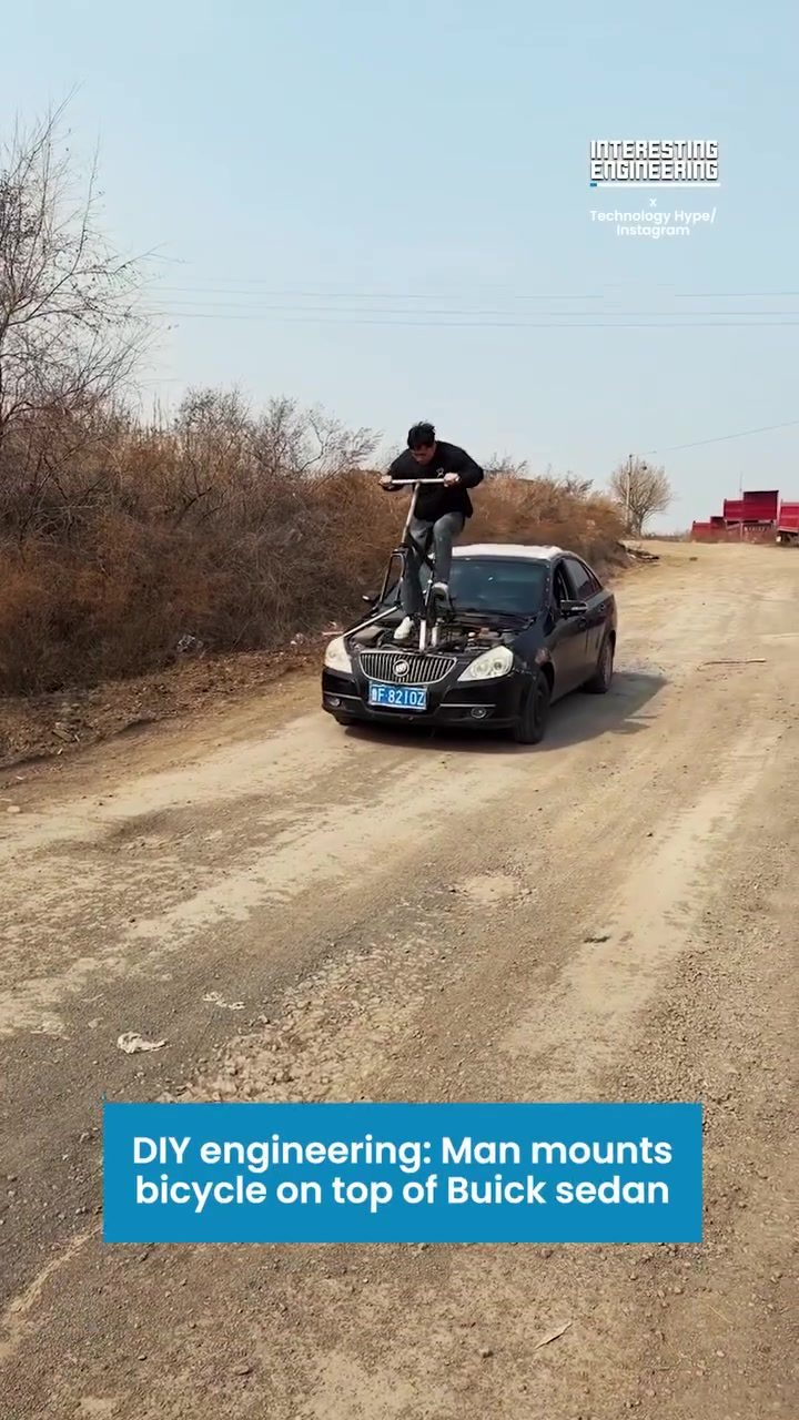 Man Steers Buick Using Bicycle Mounted in Engine Bay