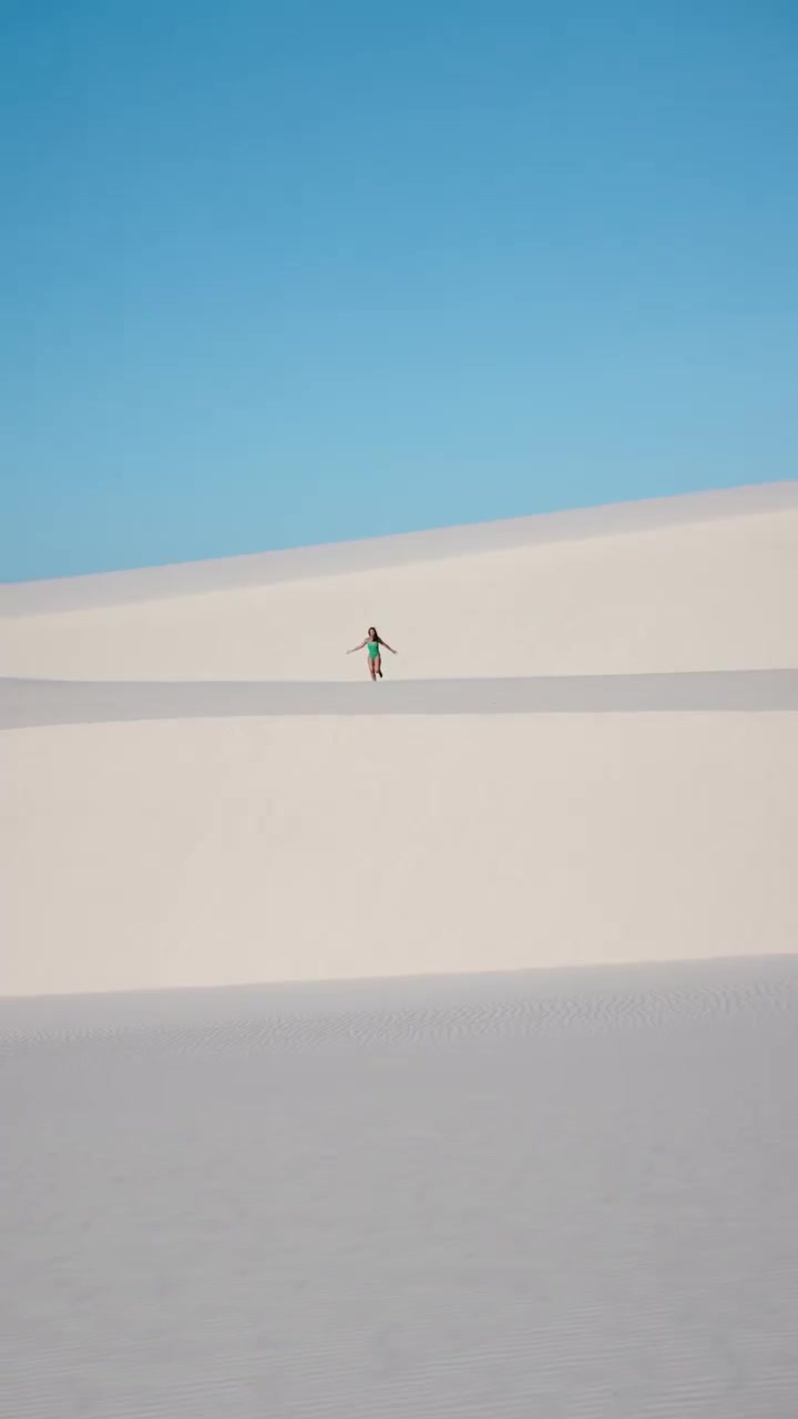 Desert Kitesurfing: Aerial Views of White Sand and Water