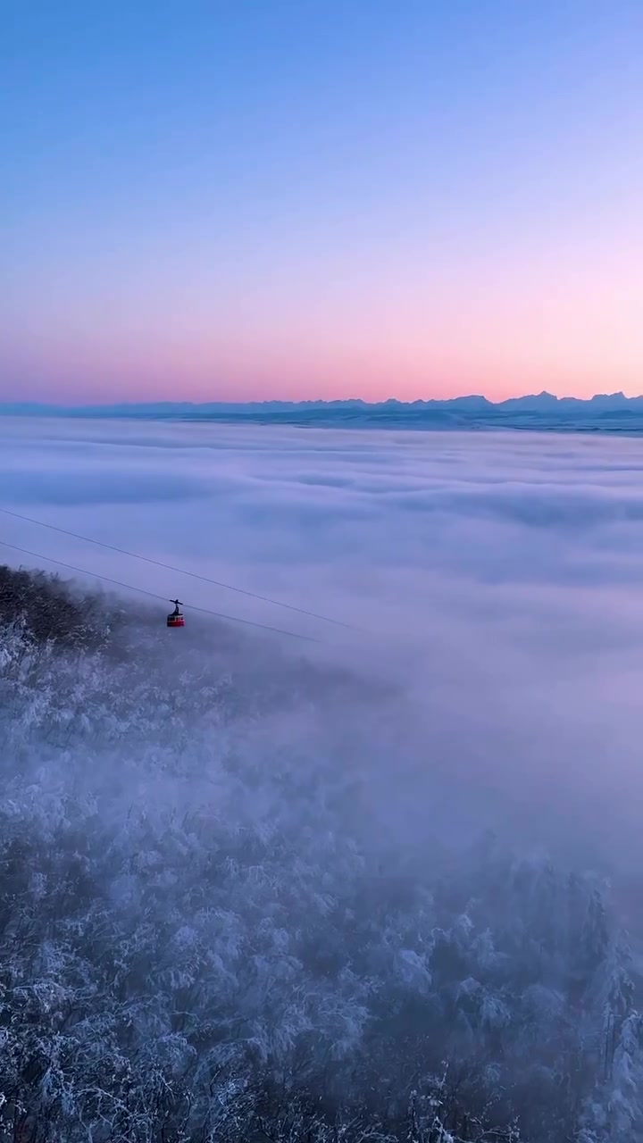 Mountain Sunrise Over Sea of Clouds