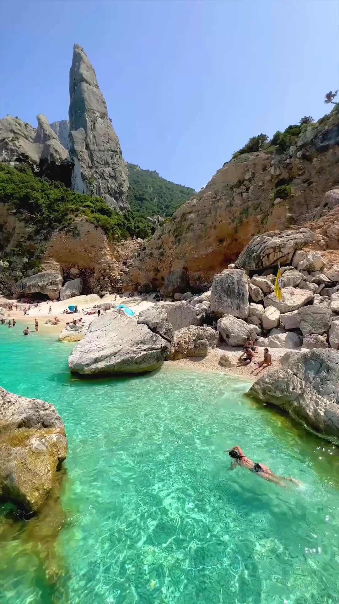 Aerial View of Turquoise Bay with Rock Formations
