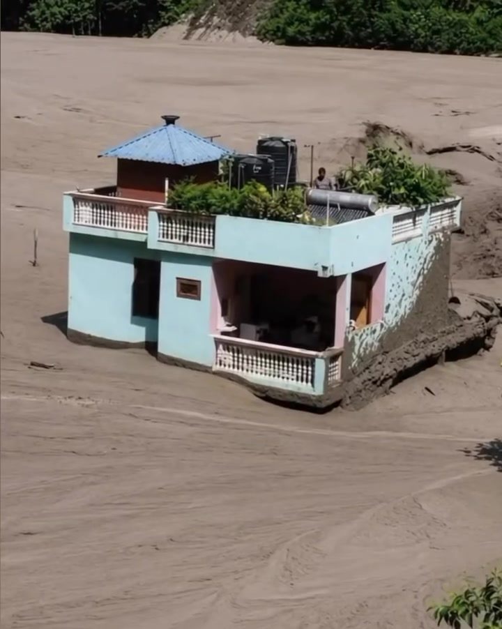 House in Sand Dunes: Disaster Relief or Unique Home