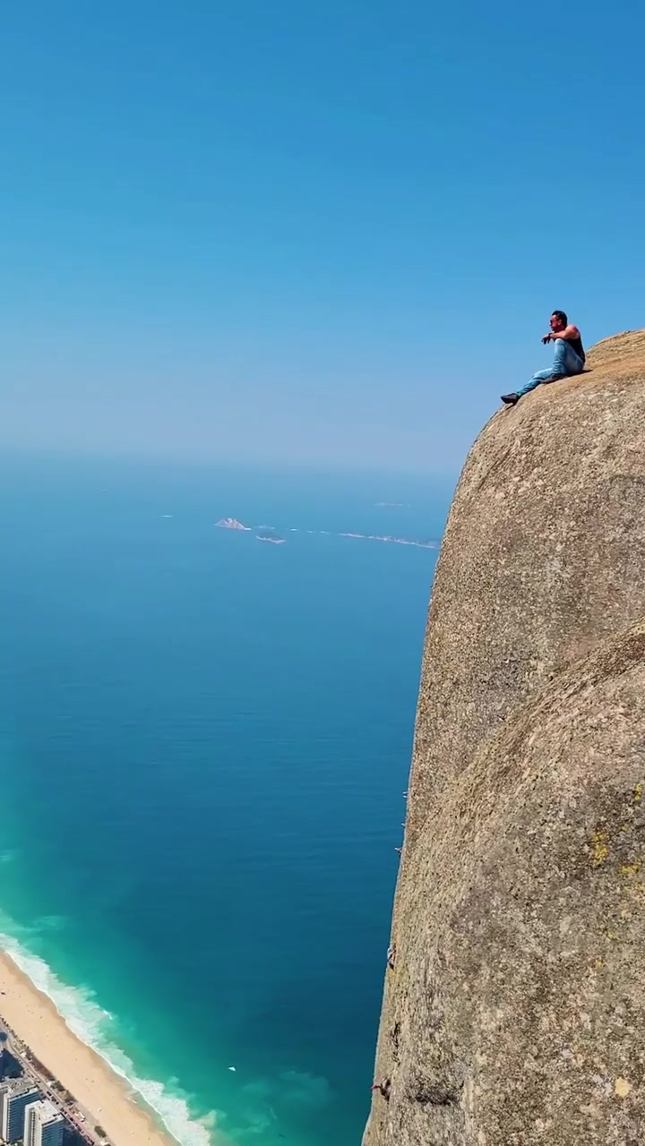 Cliff View: Coastal City Panorama from Above